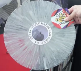 Безпечний тримач для вінілу